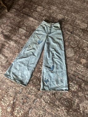 High-Rise Light Blue Wide-Leg Jeans with Heart Patch Detail